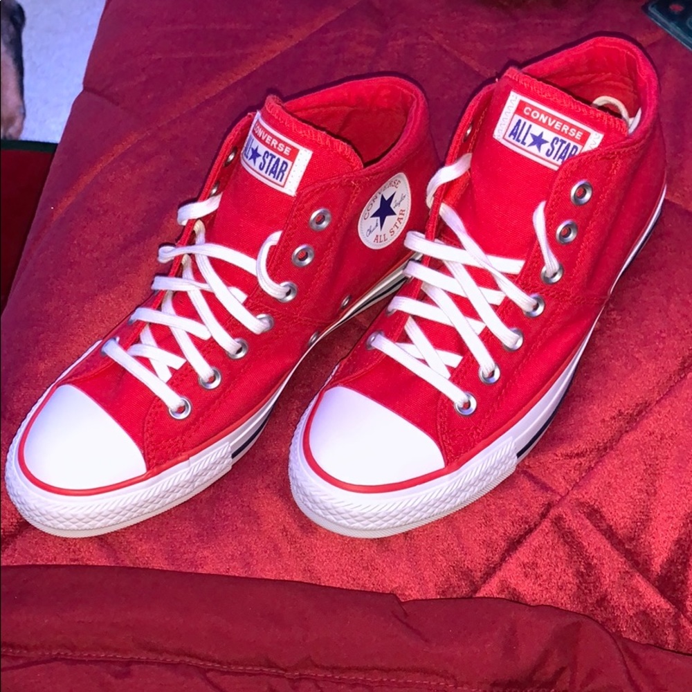 Red Converse mid-rise hightops